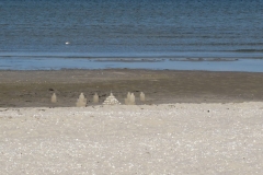 Sandburgen am Strand